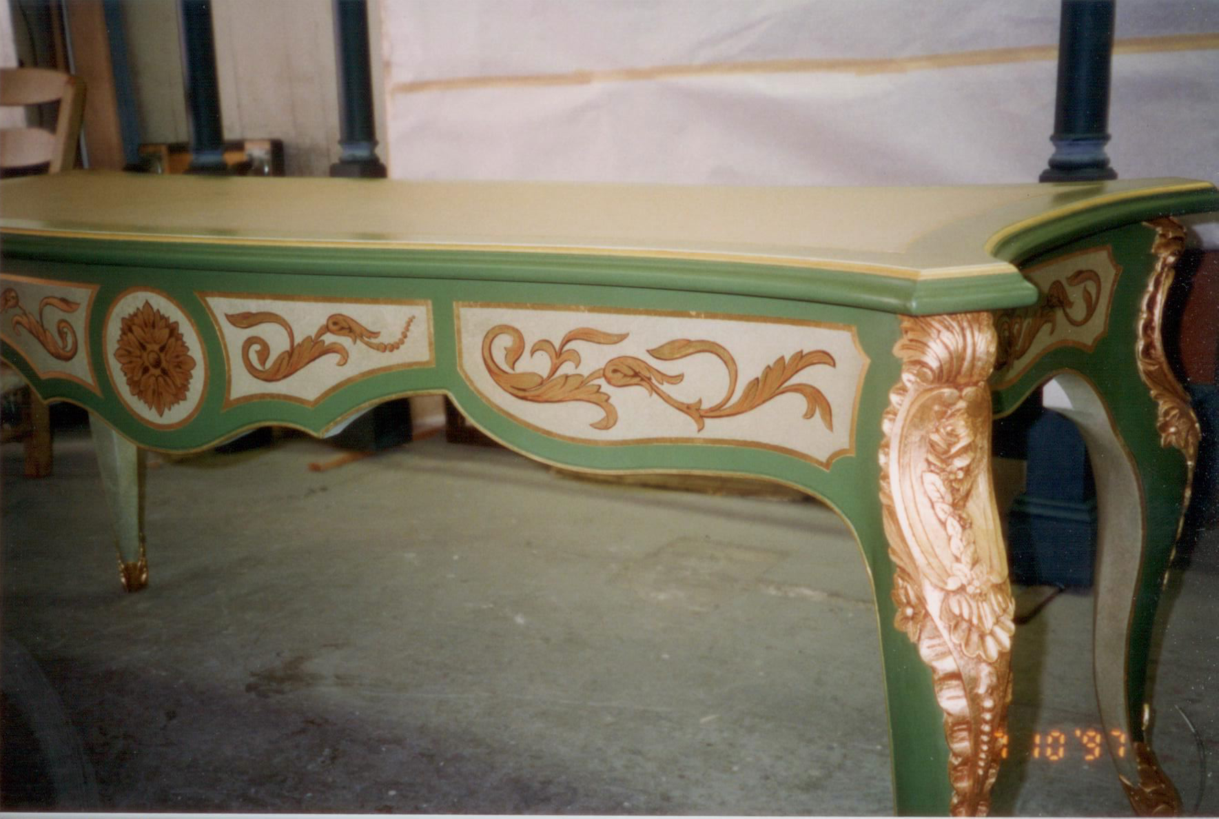 collection of antique furniture pieces including chairs and cabinets with aged finishes, professional photography